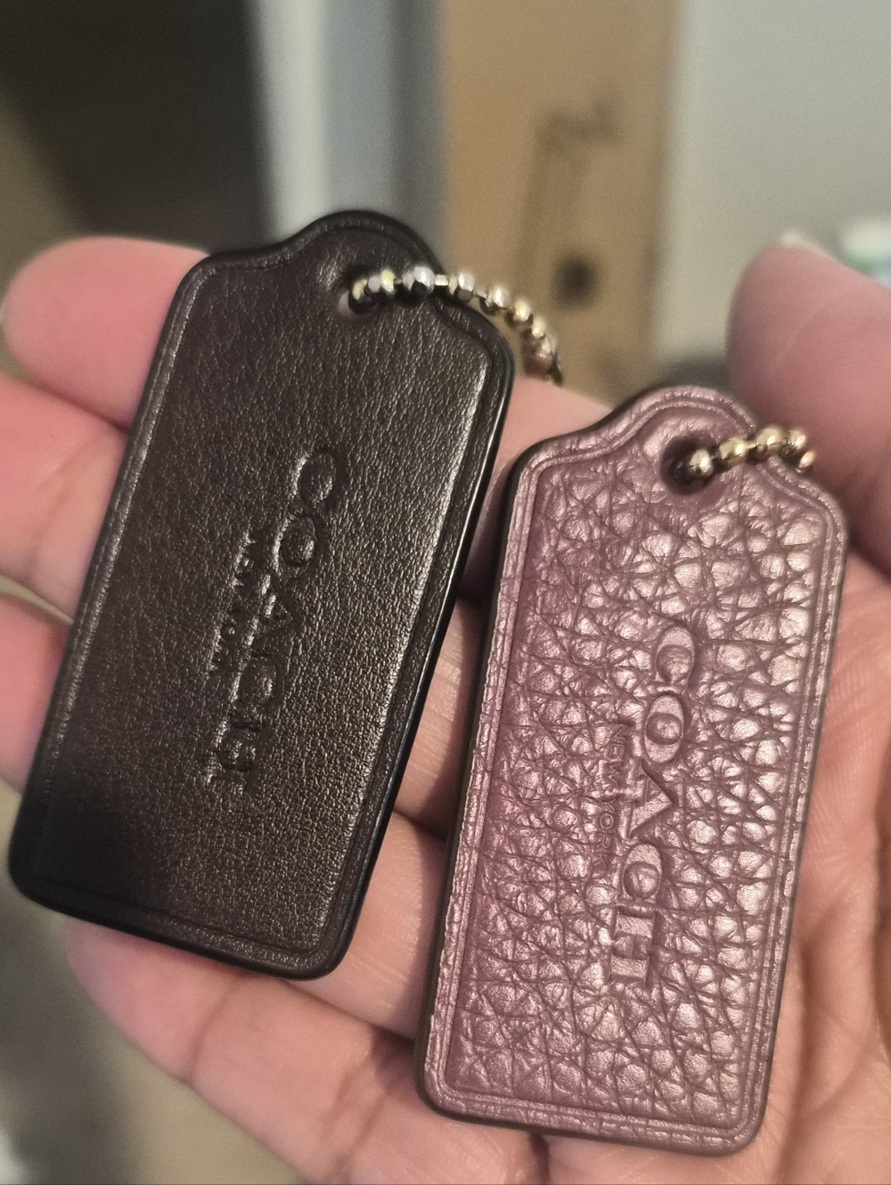 Coach Black and Mauve Leather Key Tag Set